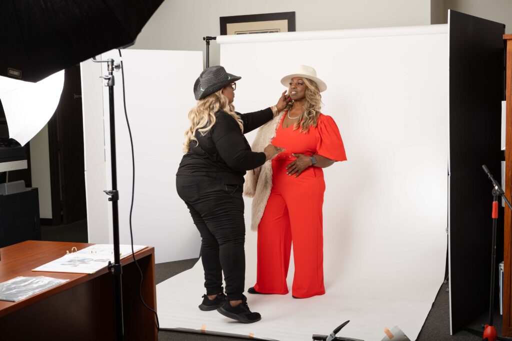 Behind-the-scenes photos of Denise Carter being styled on set and posing for branding images.
